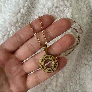 Circular nail necklace pendant